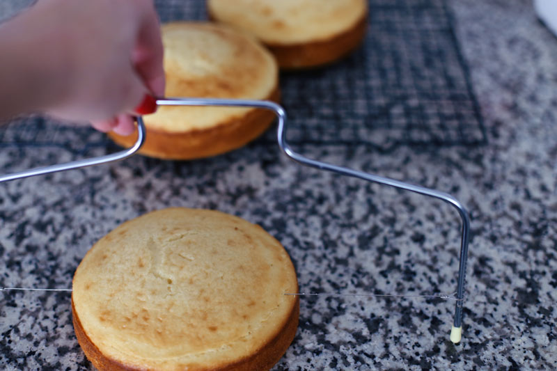 Slice the cooled cakes. Twist Me Pretty.