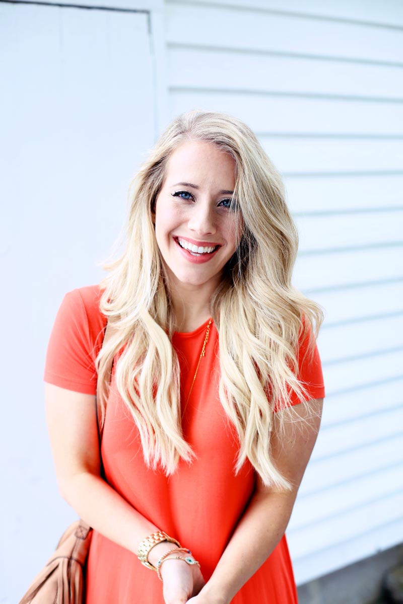 Happy times. Abby smiles at the camera.