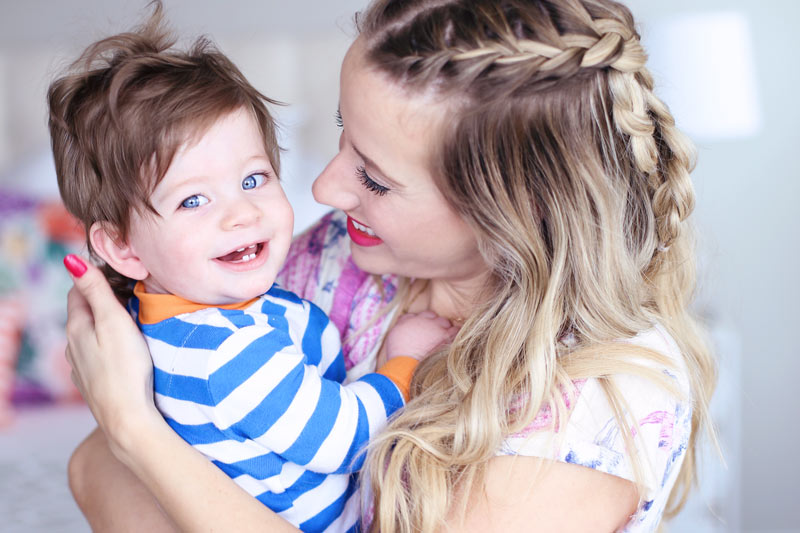 Coop gets involved in Abby's braided top-knot tutorial.