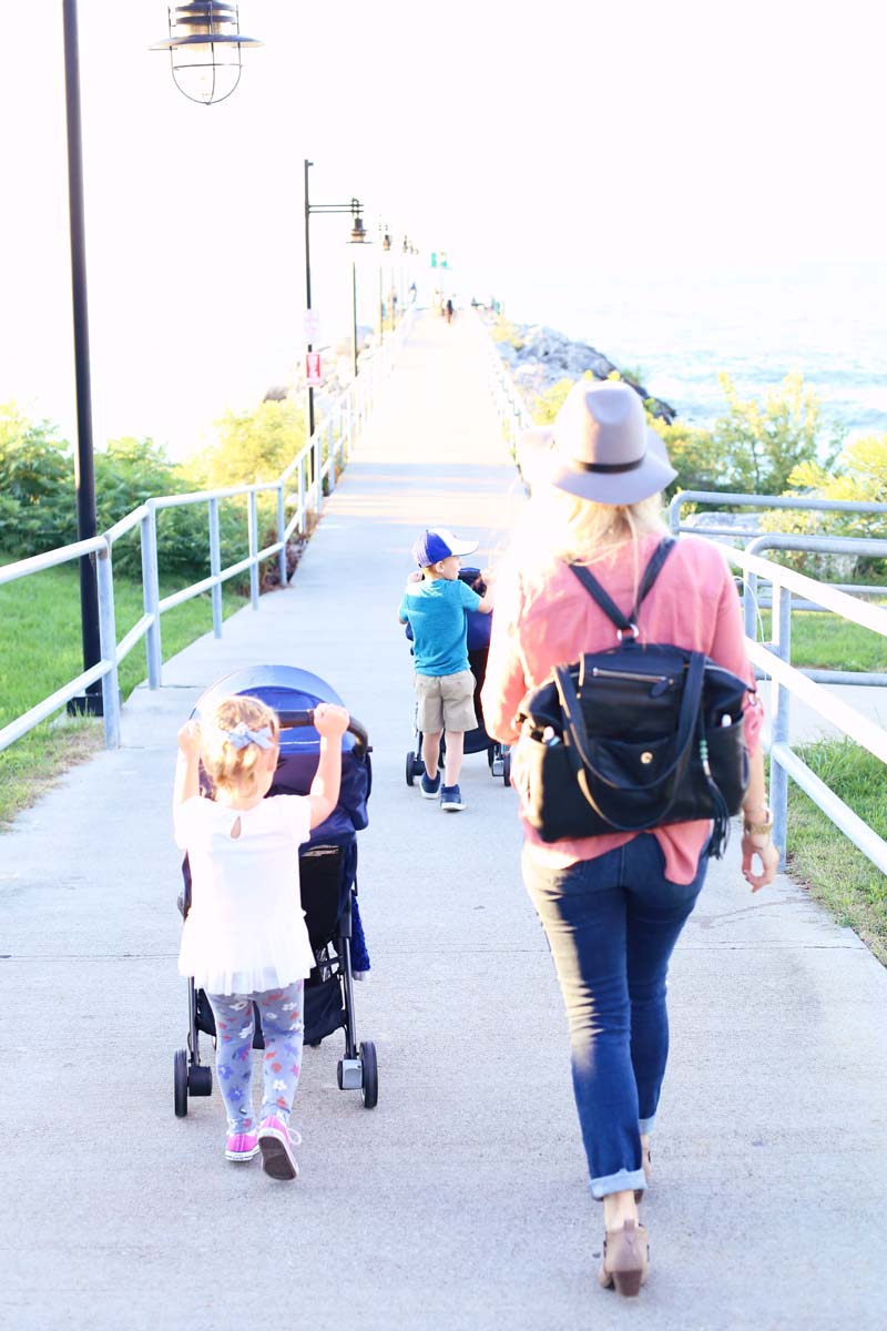 Family strolls down the pier.