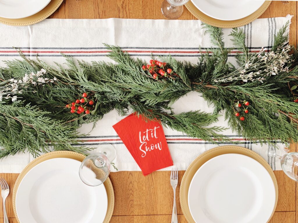 Incorporating a little bit of greenery to decorate your holiday table is an easy way to add a beautiful touch to any centerpiece.